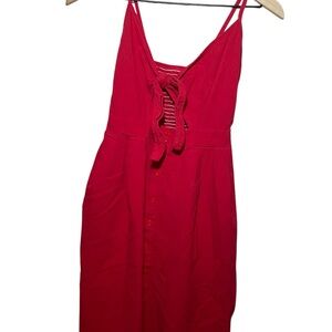Red Sleeveless Dress with Bow Detail fits like a medium